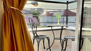 Deluxe Double Room, City View | Terrace/patio