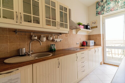 Red by Grand Apartments