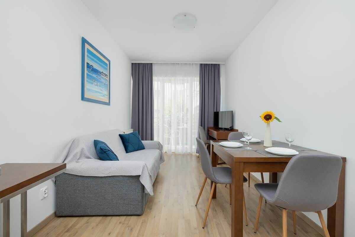 Living room with kitchenette.