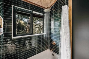 Shower, hair dryer, towels, shampoo