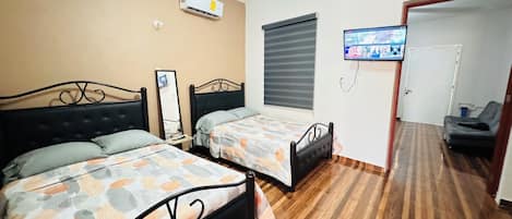 2 dormitorios, tabla de planchar con plancha, wifi gratis y ropa de cama