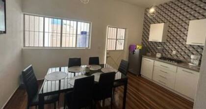 Little house, half a block from the beach”