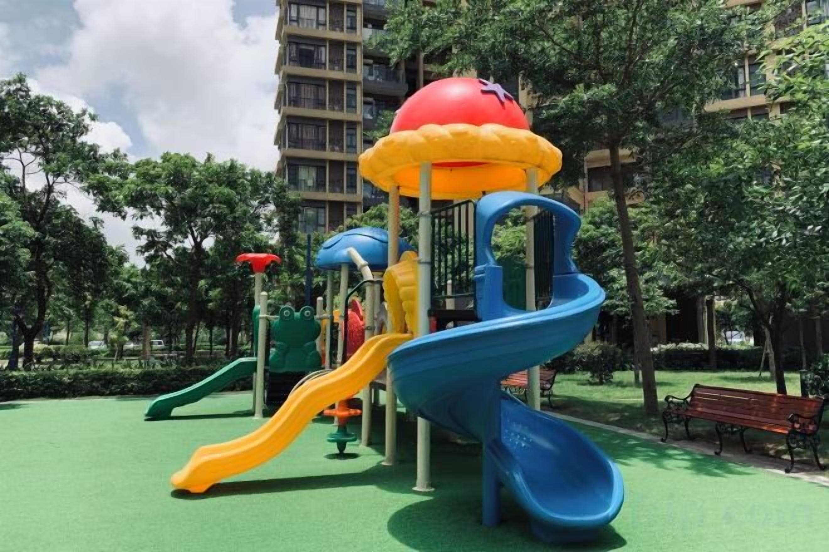 A playground with slides and climbing structures.
