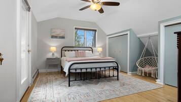 2 dormitorios, caja fuerte, tabla de planchar con plancha