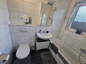 Hair dryer, towels, soap, shampoo