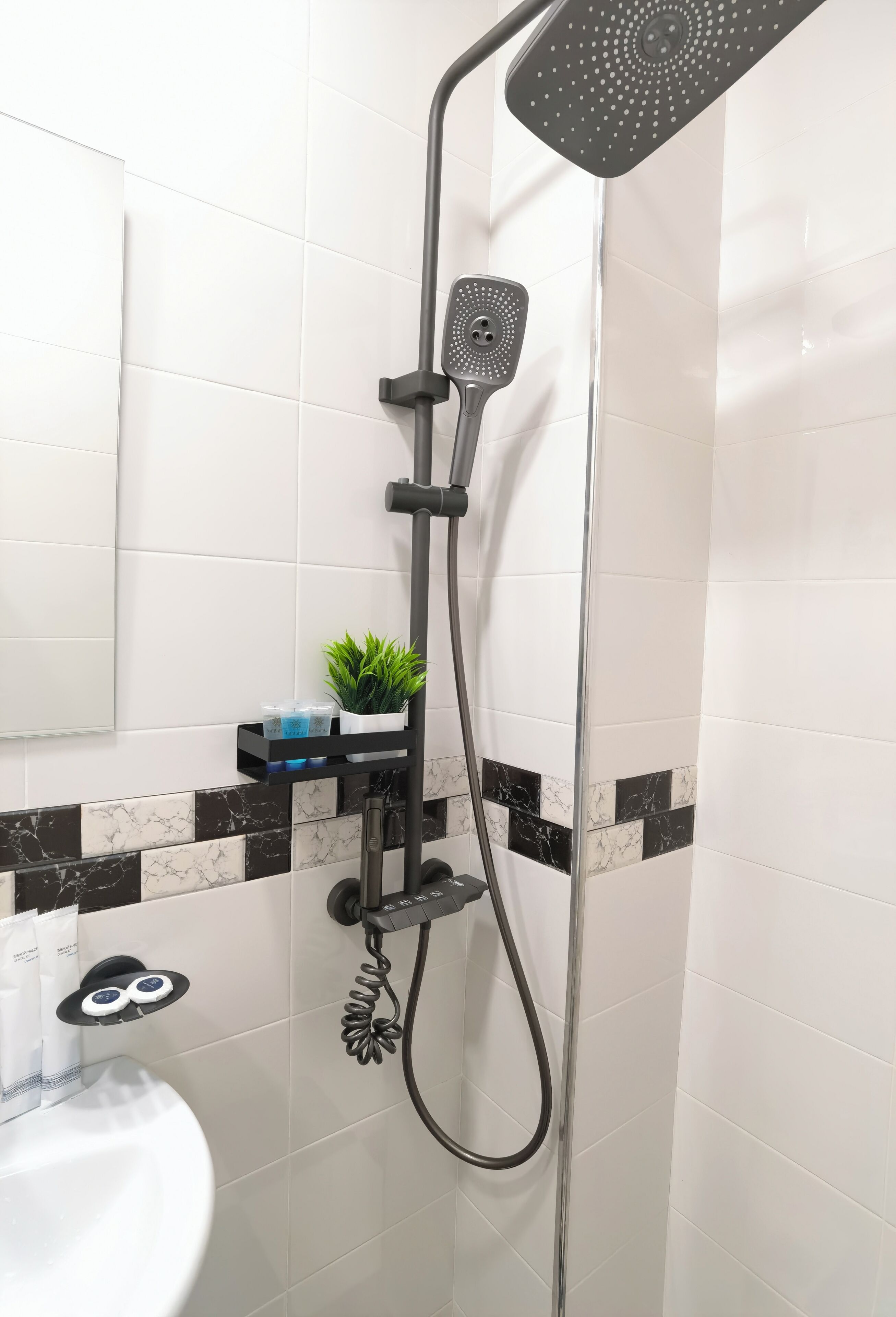 Shower, free toiletries, hair dryer, slippers