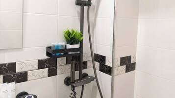 Shower, free toiletries, hair dryer, slippers