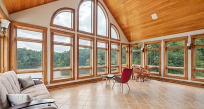 NEW LISTING! Hidden Waterfront Luxury Oasis with 9-Acre Pond by RedAwning
