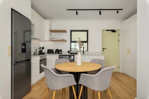 Fridge, microwave, oven, stovetop - The Sage - Designer Studio in Vibrant Sea Point (Cape Town)