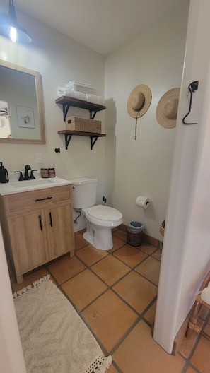 Hair dryer, towels, soap, shampoo