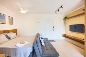 Apartamento conforto, ao lado da praia | Área de estar