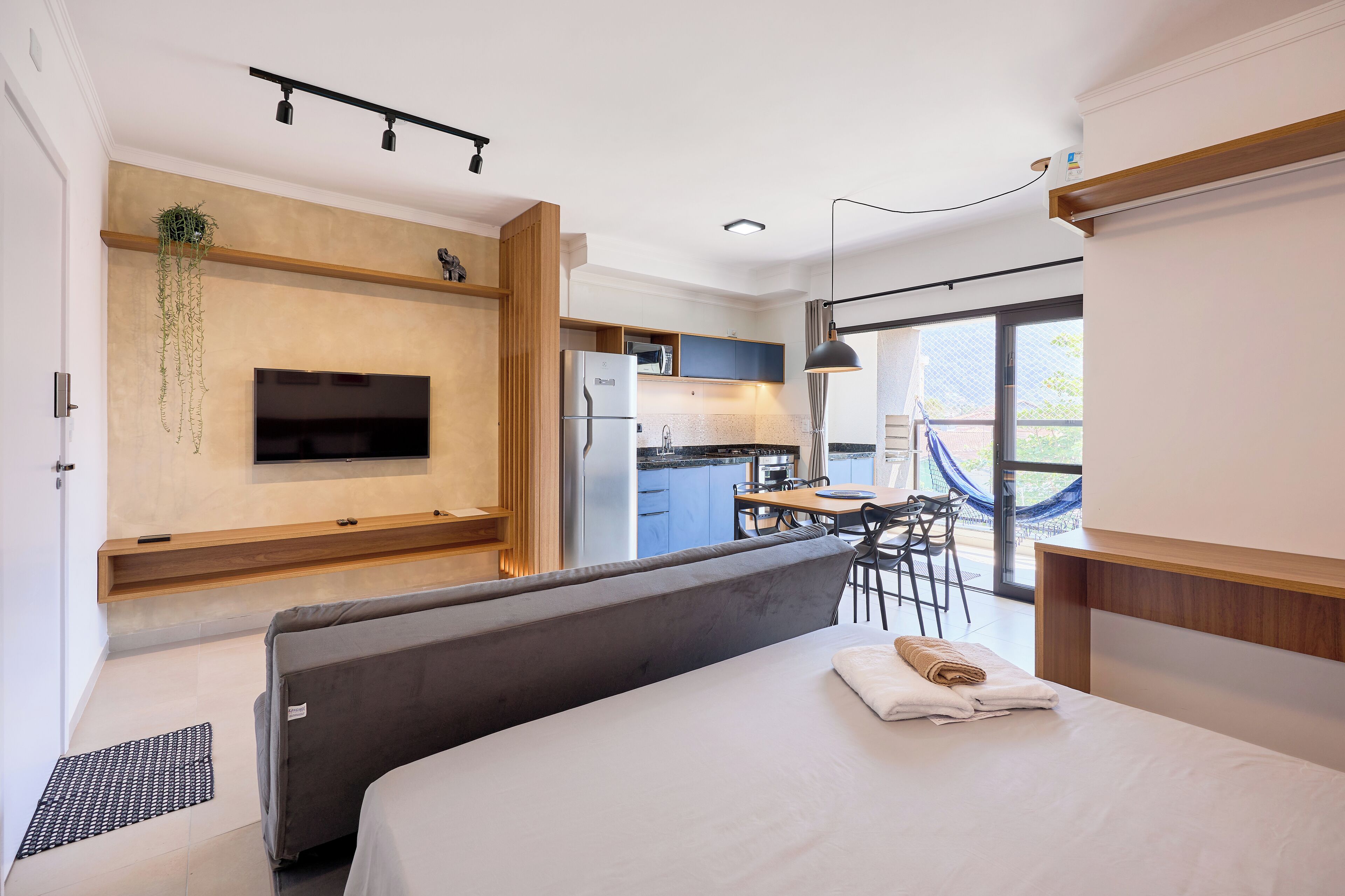 Apartamento conforto, ao lado da praia | Área de estar