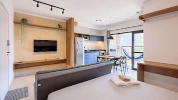 Apartamento conforto, ao lado da praia | Área de estar