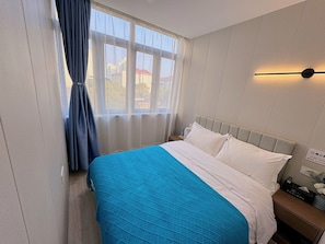 Blackout drapes, soundproofing, iron/ironing board, free WiFi