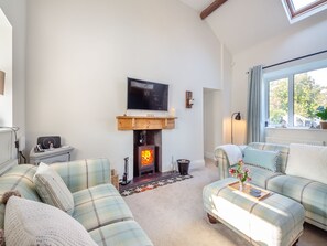 Fireplace - Tyn Giat Cottage offers a perfect home for your relaxing getaways. (Amlwch and North Anglesey Heritage Coast)
