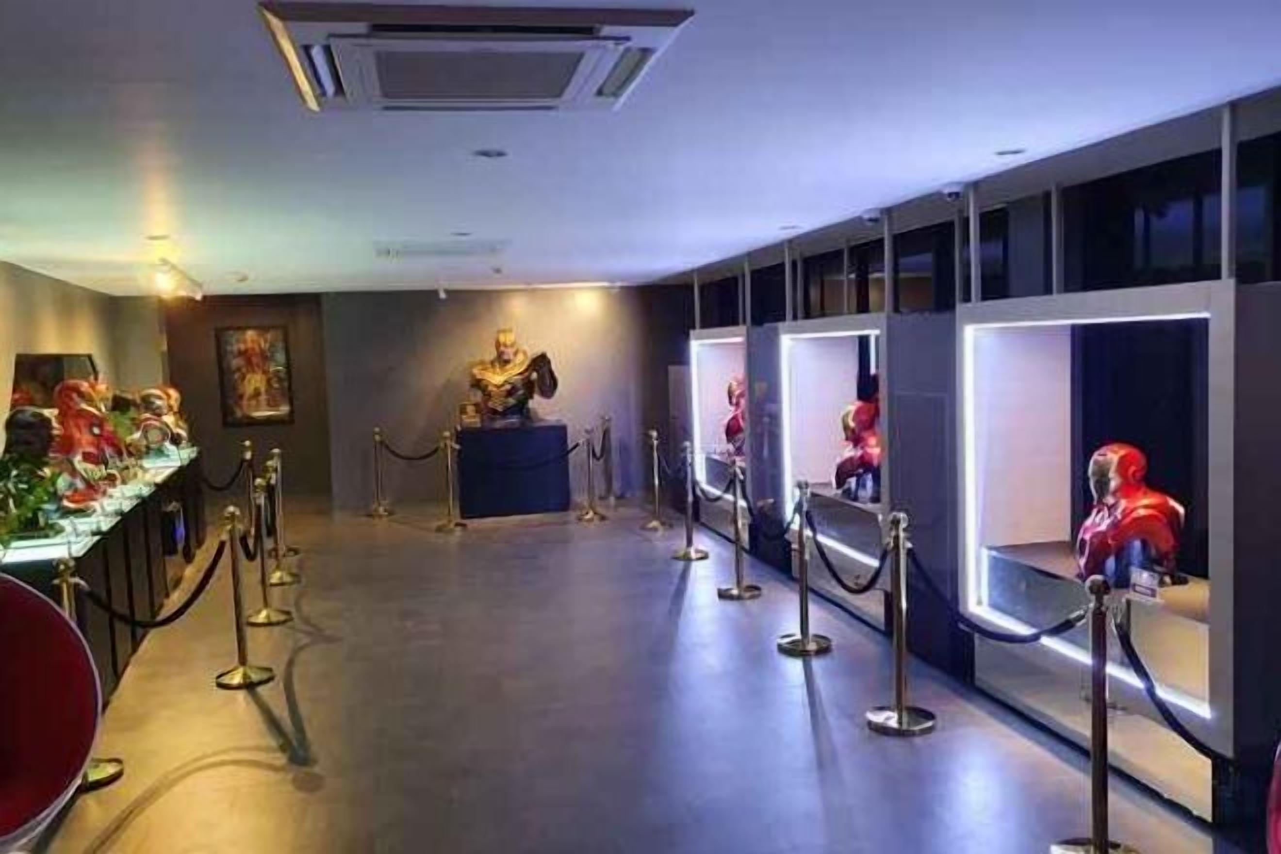 A museum with glass display cases containing various exhibits.