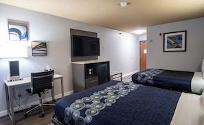 Enjoy a comfortable stay in this stylish room featuring a single bed, desk, flat-screen TV, and kitchenette.