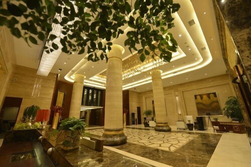 Huanuo Xinjinglun International Hotel