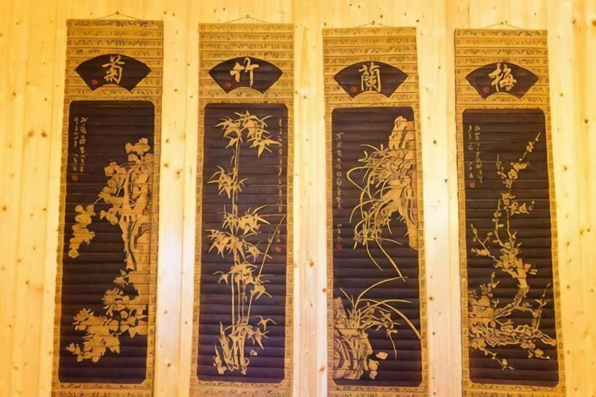 A traditional Japanese sliding door with intricate floral designs.