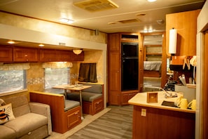 Interior - Cozy RV with fire pit on 7 acres in Winder ONLY 20 minutes from the UGA stadium  (Winder)