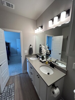 Shower, towels, soap, toilet paper