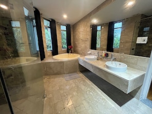 Shower, hair dryer, towels, soap