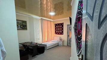 Basic Triple Room, City View | Select Comfort beds, desk, laptop workspace, blackout curtains