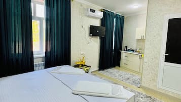 Basic Triple Room, City View | 1 bedroom, Select Comfort beds, desk, laptop workspace