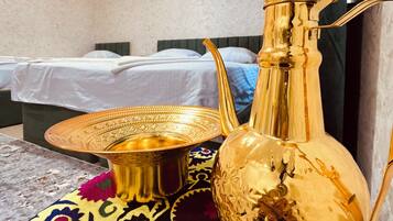 Basic Triple Room, City View | Living area | 32-inch Smart TV with digital channels, printers