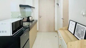 デラックス スタジオ シティビュー | 専用キッチン | 冷蔵庫、電子レンジ、コンロ、食器洗い機