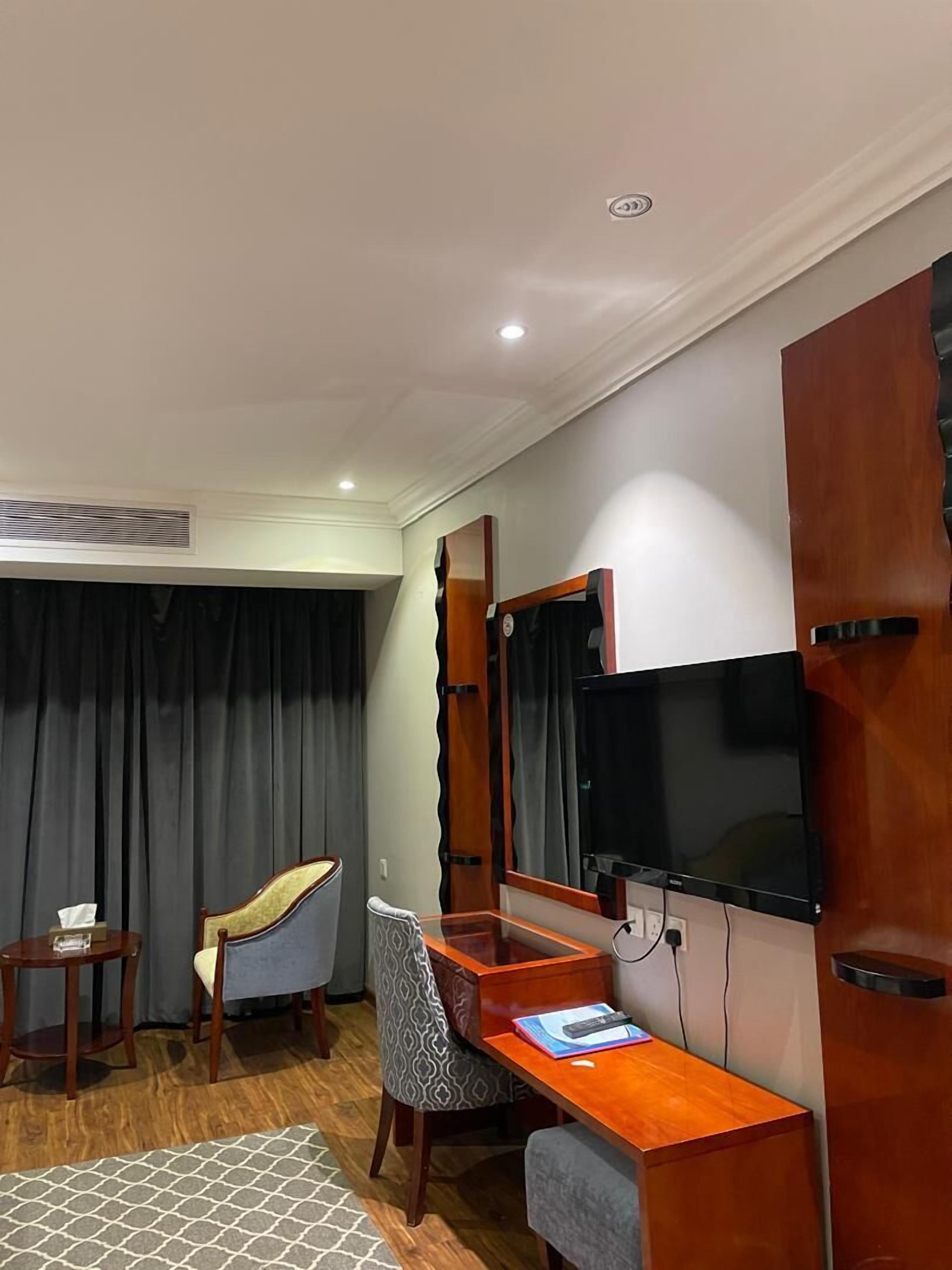 Desk, laptop workspace, free WiFi, bed sheets