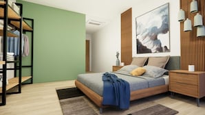 A modern bedroom with a bed, bedside tables, a wardrobe, and a painting on the wall. - Apartment De Thamel  (Kathmandu)