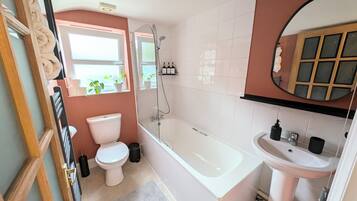 Hair dryer, towels, soap, shampoo