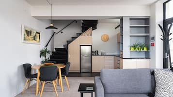 City Apartment, City View | Living area | Flat-screen TV