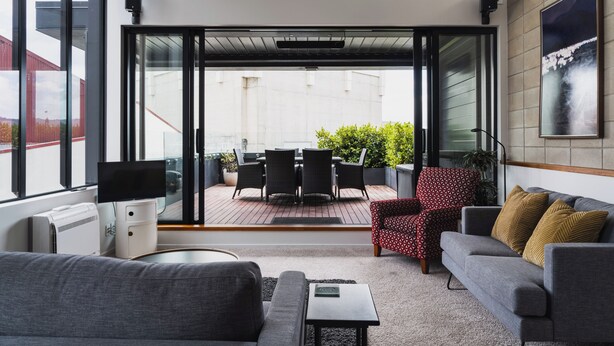 City Apartment, City View | Living area | Flat-screen TV - Deluxe Inner-city Apartment on Moray (Dunedin)