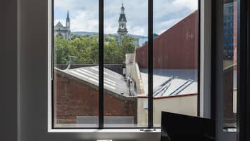 City Apartment, City View | Living area | Flat-screen TV