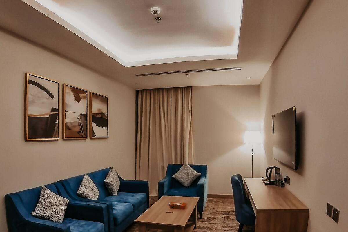 Junior Suite, City View | Living area | Smart TV