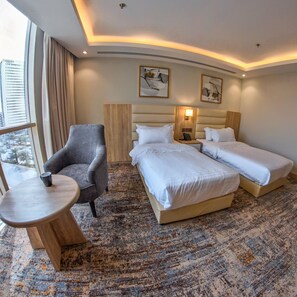 Premium bedding, pillowtop beds, in-room safe, laptop workspace