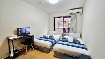 Hypo-allergenic bedding, desk, blackout drapes, iron/ironing board
