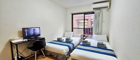 Hypo-allergenic bedding, desk, blackout curtains, iron/ironing board