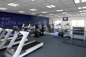 A modern gym with treadmills, elliptical machines, and free weights. - Holiday Inn Express & Suites Cushing by IHG (Cushing)