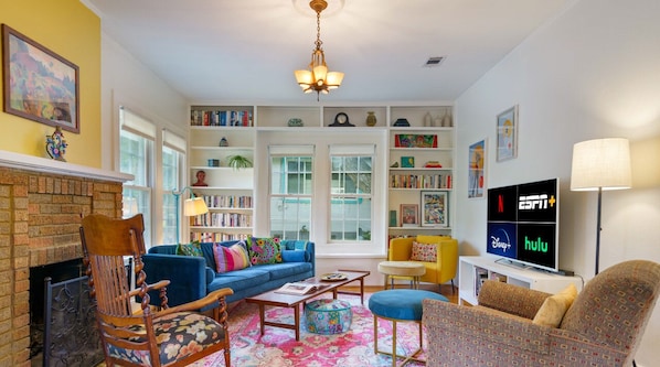 Smart TV, fireplace, books