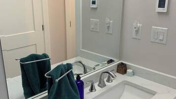 Hair dryer, towels, soap, shampoo