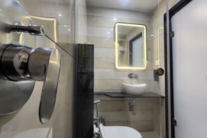 Executive Room, City View | Bathroom | Shower, hair dryer, slippers, towels - Kashi Vilaa (Varanasi)