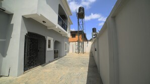 Unclassified image, 5 of 38, button - Charming 2-Bedroom House in Ajah with AC & WiFi (ajah)