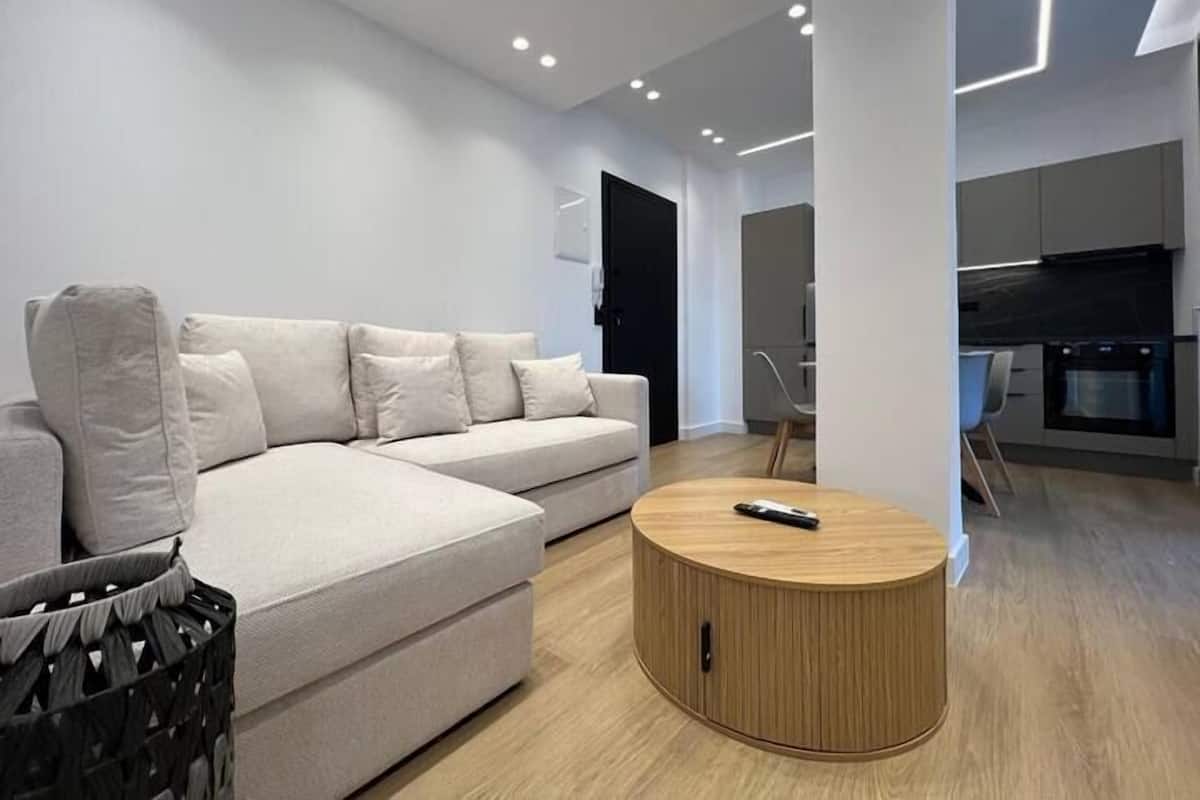 Exclusive Apartment | Living area | Flat-screen TV