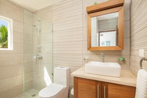 Shower, towels, soap, toilet paper