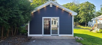 Cozy Sebago cottage with community dock, swimming and mooring.