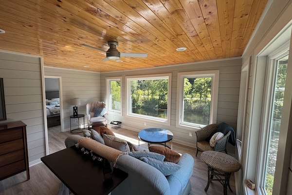 Sunroom with view of the river