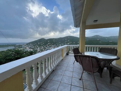 "Your Caribbean Haven: Where Comfort Meets Local Charm"